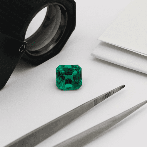Emerald History with Loupe