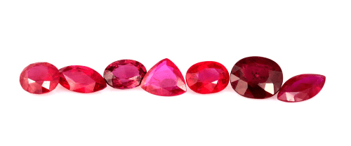 Different shapes and carats of rubies used to show their characteristics.