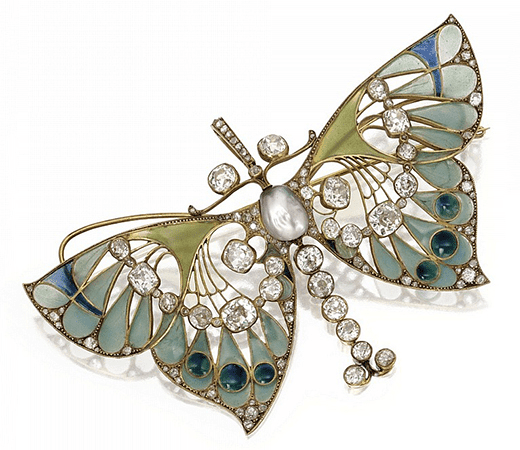 a butterfly studded with diamond and gemstones representing ART NOUVEAU (1890-1910) jeweller era.