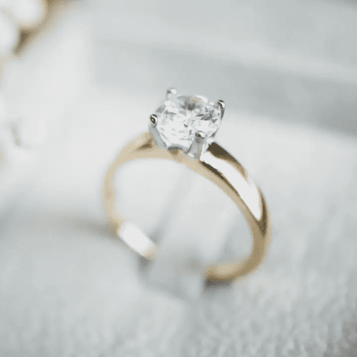 gold and single diamonds ring